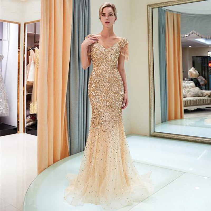 2025 2025 Popular trade new women's clothing slim-fitting fishtail skirt ebay sexy shoulder sleeve V-neck dress sprinkled gold dress