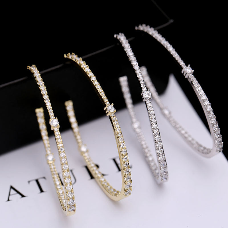 2025 Korean personality fashion tassel exaggerated micro-inlaid zircon 925 silver needle hoop earrings female geometric oval earrings
