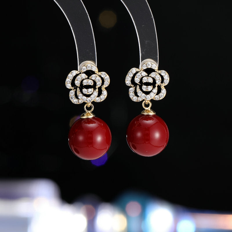 2025 S925 silver needle camellia pearl earrings Tianmei temperament Ankola red retro high-end flower autumn and winter earrings