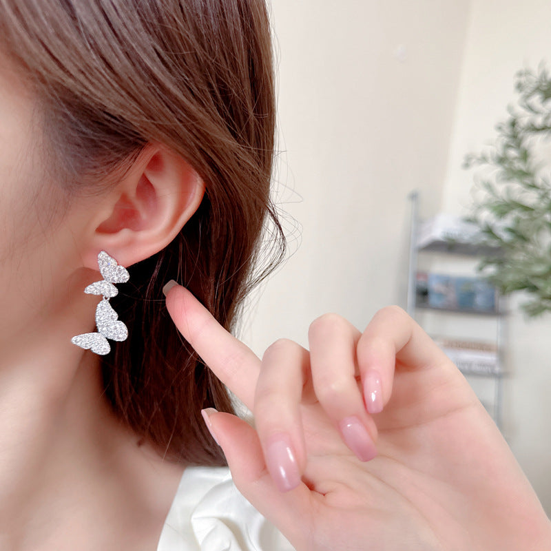 2025 Exquisite full diamond double butterfly earrings S925 silver needle women's light luxury temperament versatile niche design temperament earrings