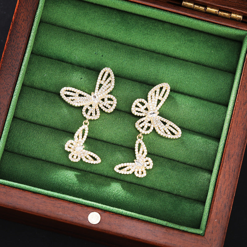 2025 Niche high-end micro-inlaid zirconium hollow butterfly earrings s925 silver needle design exquisite versatile temperament earrings