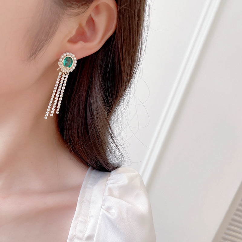 2025 Light luxury high-end oval long bow fringed earrings s925 silver needle temperament niche elegant retro earrings