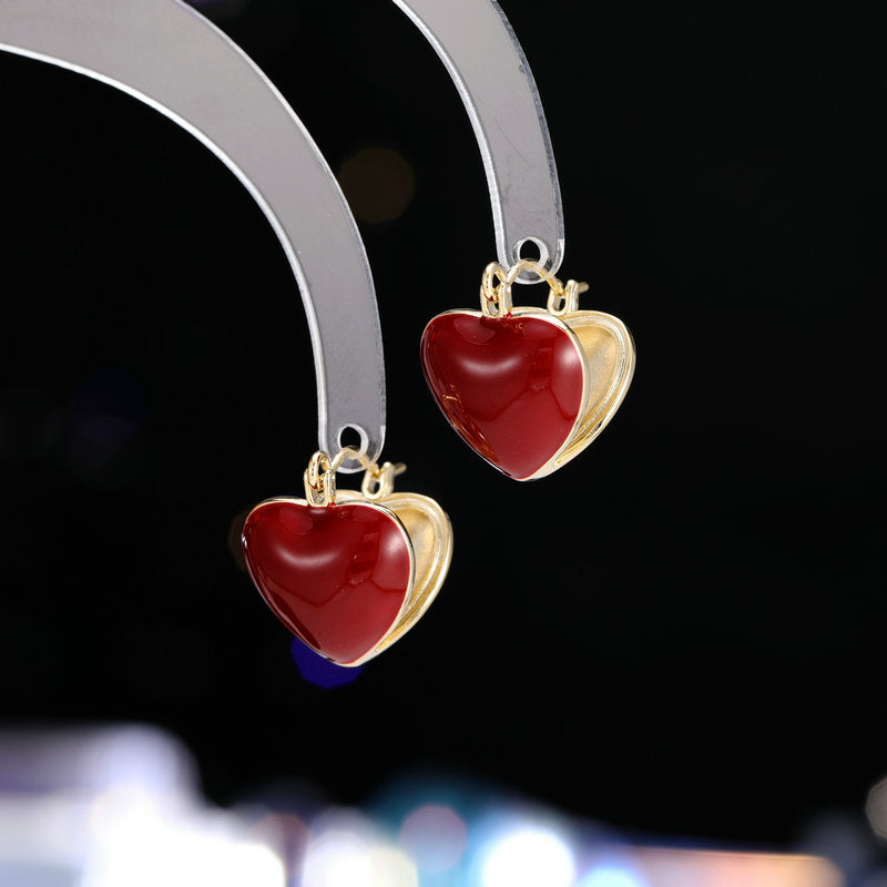2025 Sweet temperament Ankola red ear buckle Hong Kong style retro heart super fairy girl heart double-sided dripping oil love earrings
