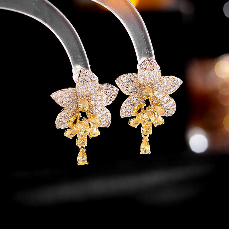 2025 Korean new style temperament fashion earrings copper inlaid colored zirconium earrings female 925 silver needle full zirconium inlaid flower earrings
