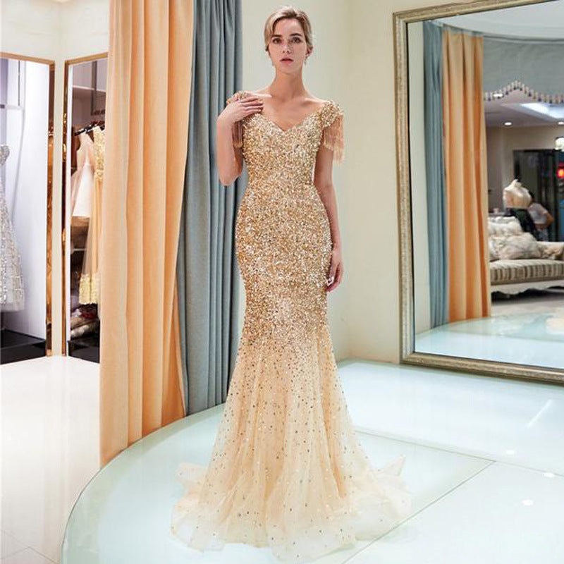 2025 2025 Popular trade new women's clothing slim-fitting fishtail skirt ebay sexy shoulder sleeve V-neck dress sprinkled gold dress