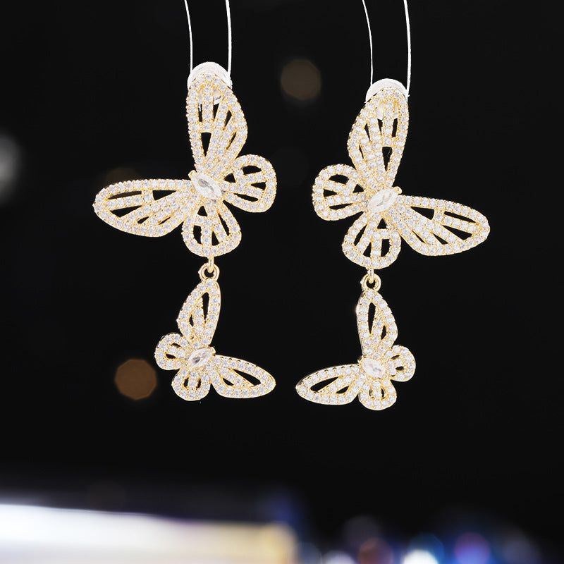 2025 Niche high-end micro-inlaid zirconium hollow butterfly earrings s925 silver needle design exquisite versatile temperament earrings