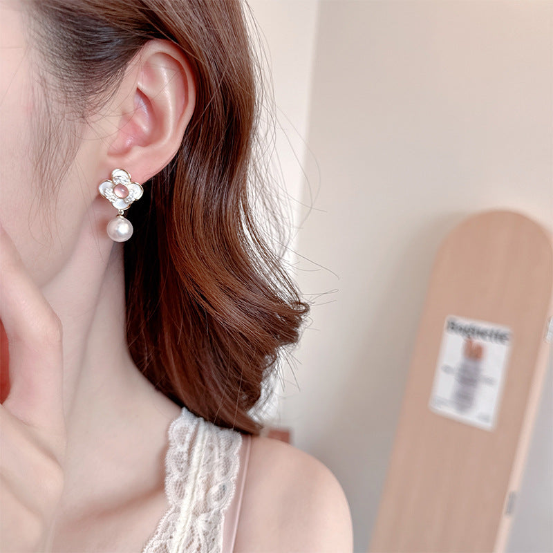 2025 High-end earrings female niche fresh fairy wind jade light luxury inlaid zircon s925 silver needle camellia earrings