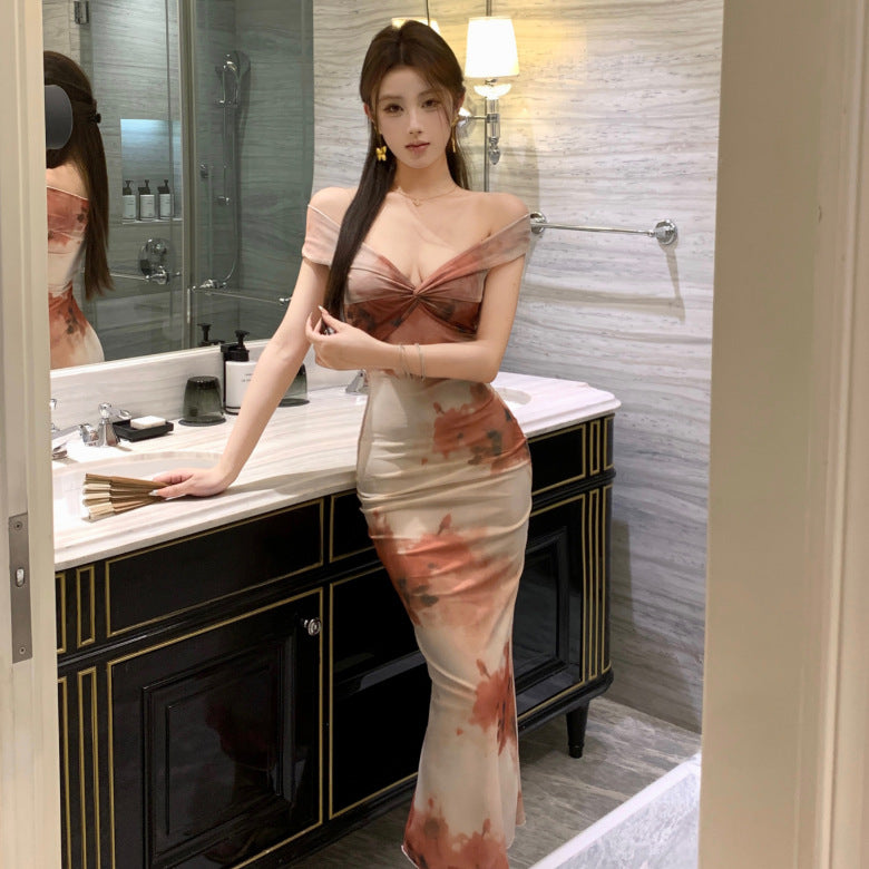 2025 Celebrity women's clothing new sexy one-word shoulder mesh printing slim and thin bag arm fishtail banquet dress skirt