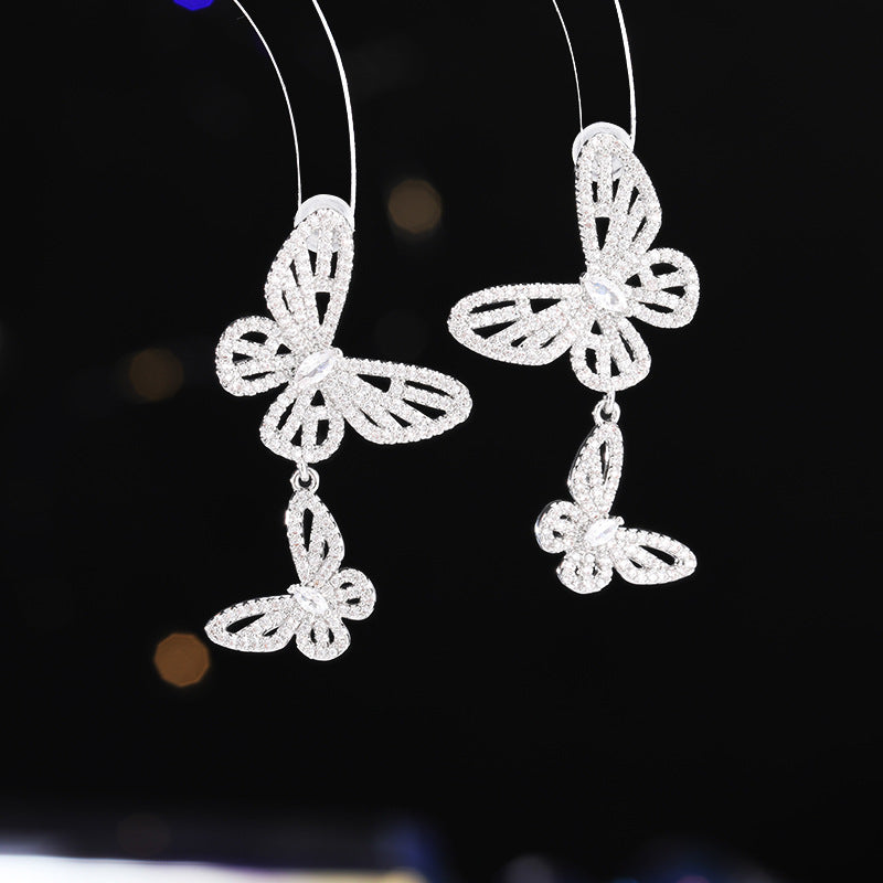 2025 Niche high-end micro-inlaid zirconium hollow butterfly earrings s925 silver needle design exquisite versatile temperament earrings