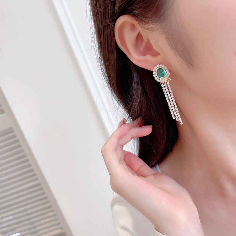 2025 Light luxury high-end oval long bow fringed earrings s925 silver needle temperament niche elegant retro earrings