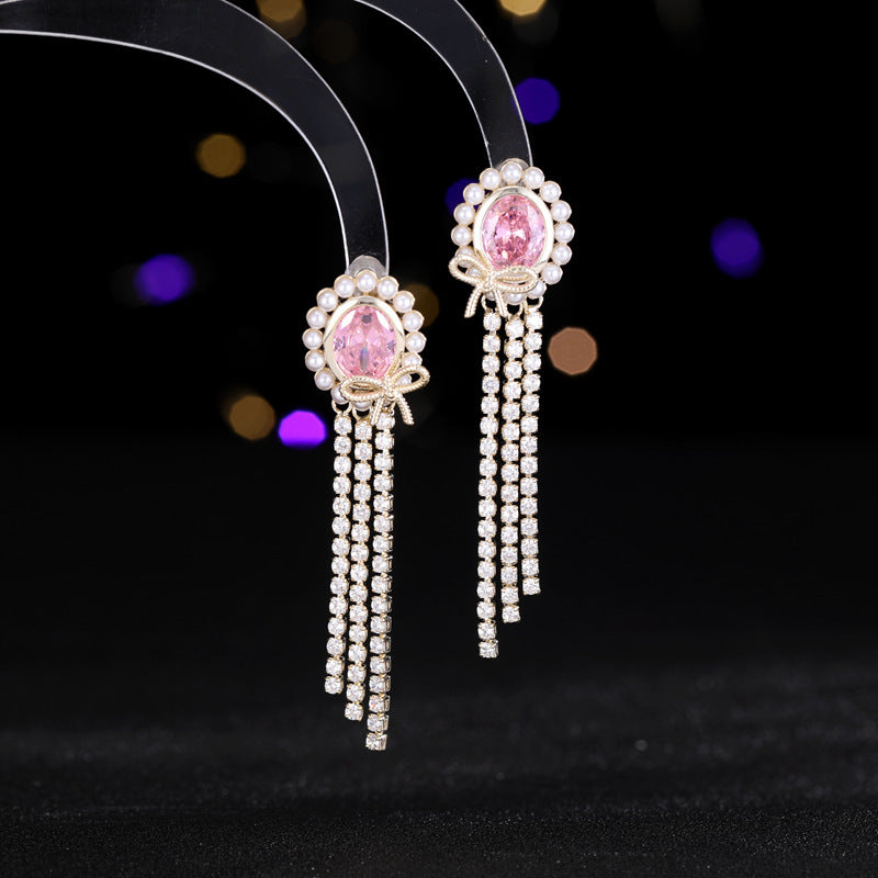 2025 Light luxury high-end oval long bow fringed earrings s925 silver needle temperament niche elegant retro earrings