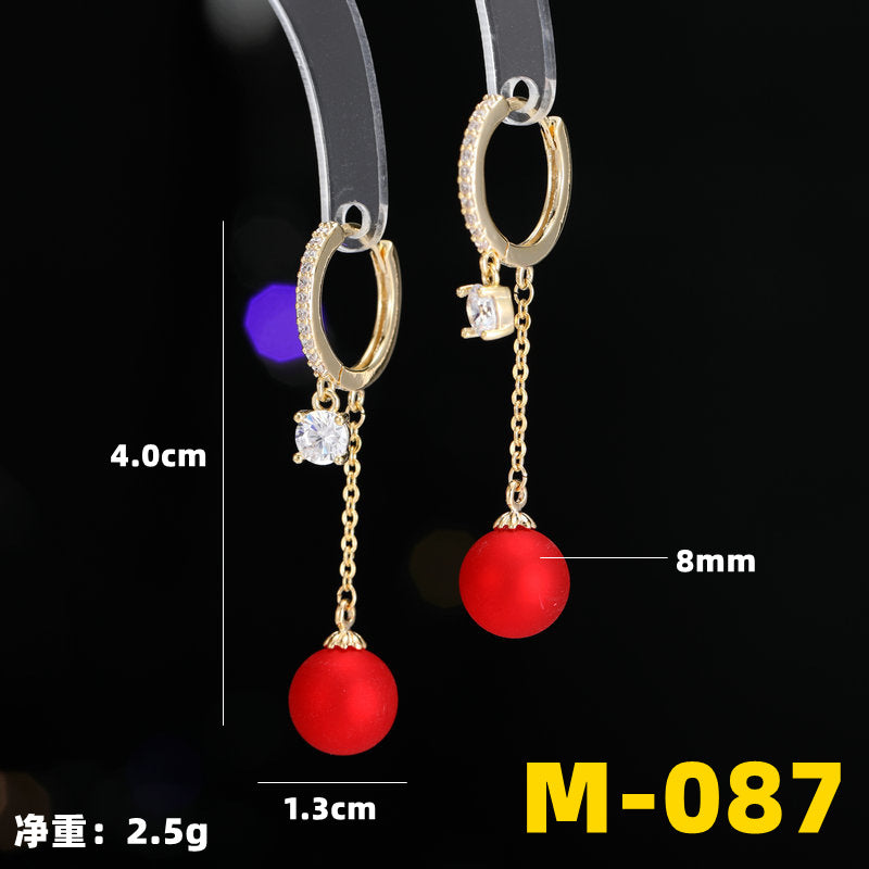2025 Earrings suitable for Chinese New Year wear, simple and versatile, trendy temperament, red pearl niche design, autumn and winter earrings wholesale