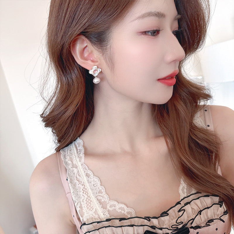 2025 High-end earrings female niche fresh fairy wind jade light luxury inlaid zircon s925 silver needle camellia earrings