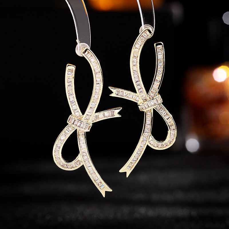 2025 elegance temperament light luxury high-end earrings niche design super fairy temperament zircon bow streamer earrings