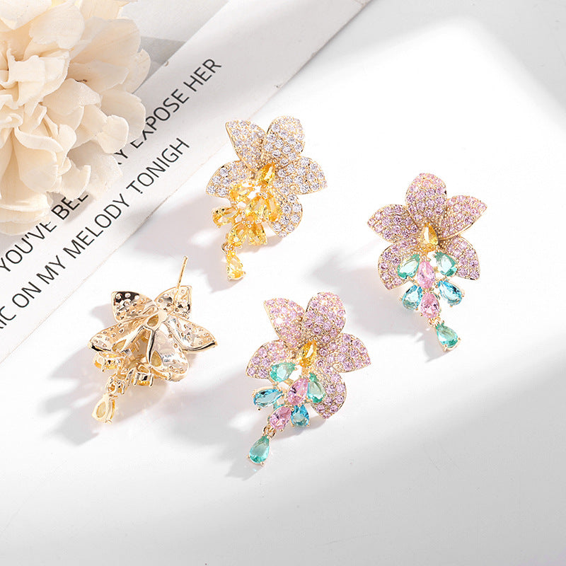 2025 Korean new style temperament fashion earrings copper inlaid colored zirconium earrings female 925 silver needle full zirconium inlaid flower earrings