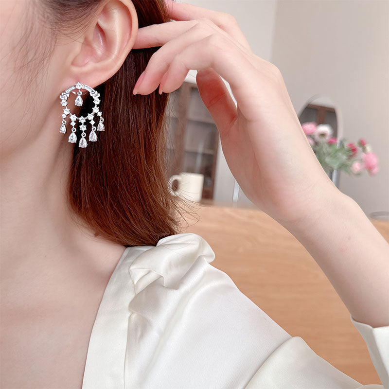 2025 Popularan circle water drop fringed personalized zircon geometric earrings s925 silver needle hollow round light luxury temperament stud earrings