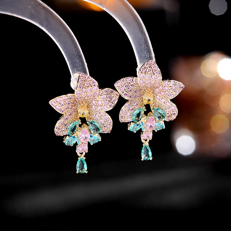 2025 Korean new style temperament fashion earrings copper inlaid colored zirconium earrings female 925 silver needle full zirconium inlaid flower earrings