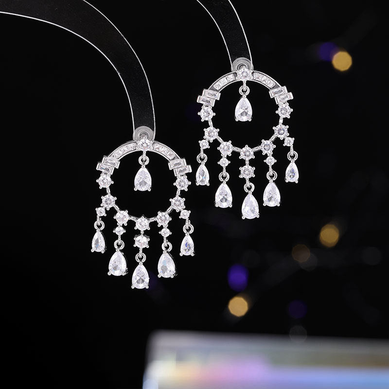 2025 Popularan circle water drop fringed personalized zircon geometric earrings s925 silver needle hollow round light luxury temperament stud earrings