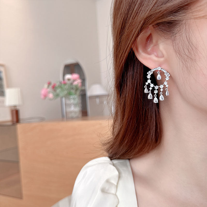 2025 Popularan circle water drop fringed personalized zircon geometric earrings s925 silver needle hollow round light luxury temperament stud earrings