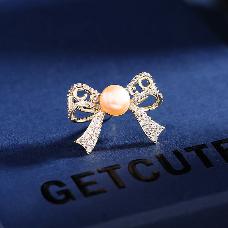 2025 Japan and South Korea spring and summer clothing temperament freshwater pearl zircon anti-light buckle pin cardigan collar pin butterfly section spike needle