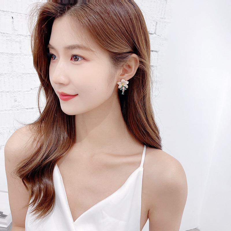 2025 Korean new style temperament fashion earrings copper inlaid colored zirconium earrings female 925 silver needle full zirconium inlaid flower earrings