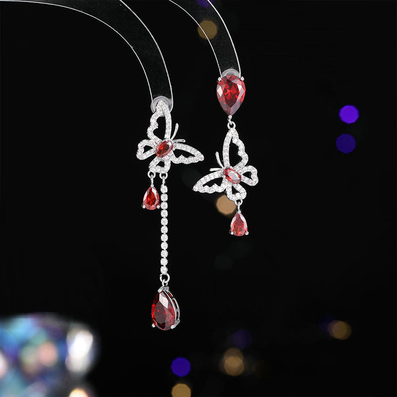 2025 New fashion asymmetrical butterfly water drop stud earrings s925 silver needle design zircon light luxury temperament high-end earrings