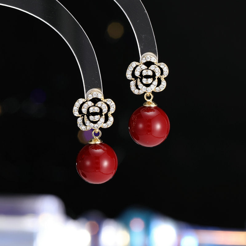 2025 S925 silver needle camellia pearl earrings Tianmei temperament Ankola red retro high-end flower autumn and winter earrings