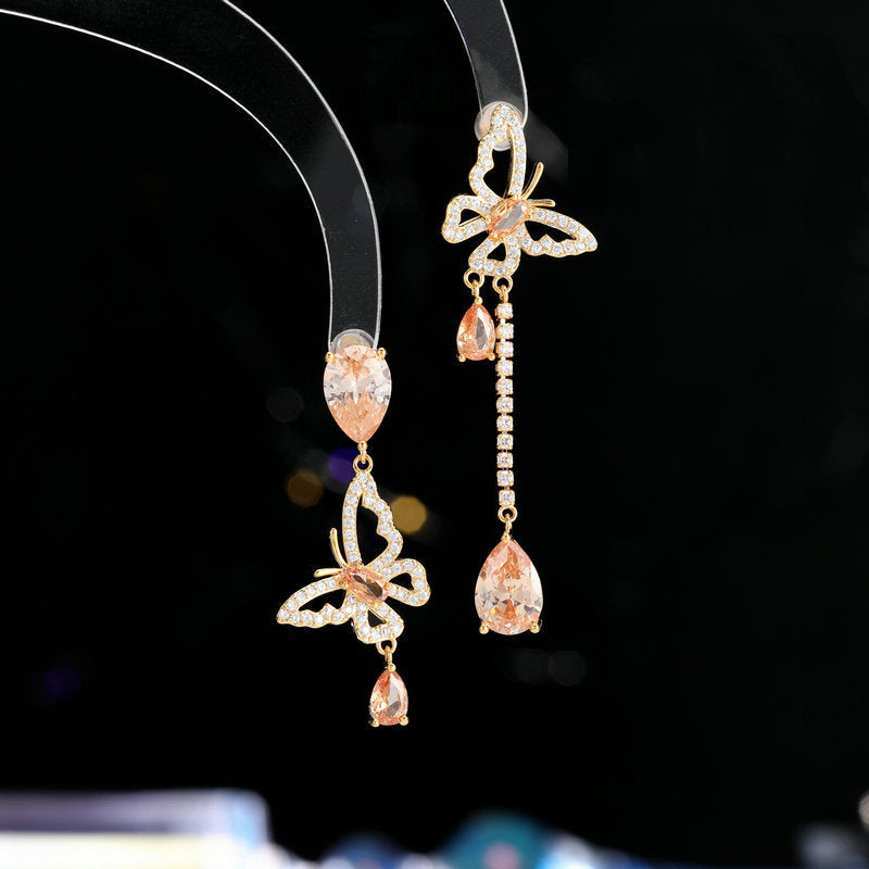 2025 New fashion asymmetrical butterfly water drop stud earrings s925 silver needle design zircon light luxury temperament high-end earrings
