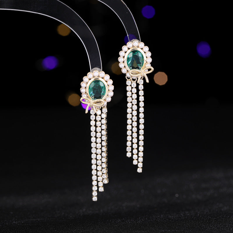 2025 Light luxury high-end oval long bow fringed earrings s925 silver needle temperament niche elegant retro earrings