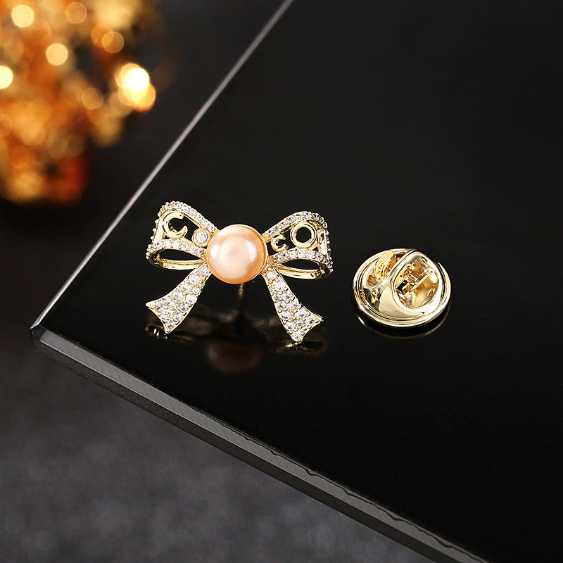 2025 Japan and South Korea spring and summer clothing temperament freshwater pearl zircon anti-light buckle pin cardigan collar pin butterfly section spike needle