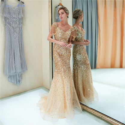 2025 2025 Popular trade new women's clothing slim-fitting fishtail skirt ebay sexy shoulder sleeve V-neck dress sprinkled gold dress