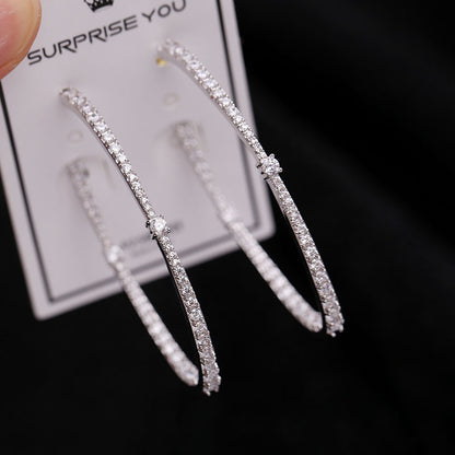 2025 Korean personality fashion tassel exaggerated micro-inlaid zircon 925 silver needle hoop earrings female geometric oval earrings