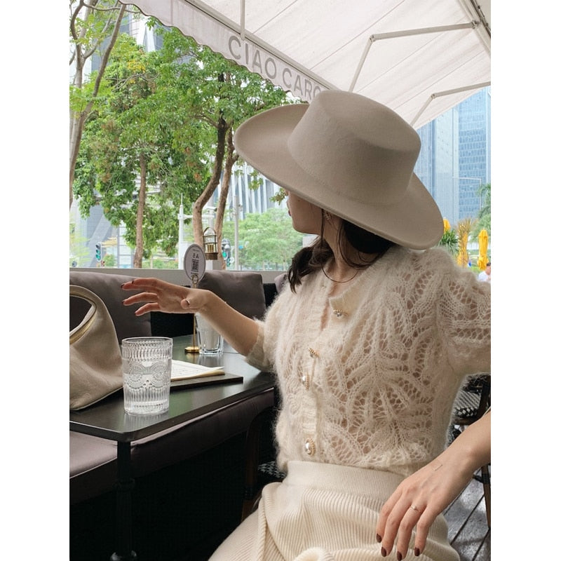 jinran 2022 new sweater autumn white openwork knitted cardigan french mohair coat sweater female air-conditioning suit 16179