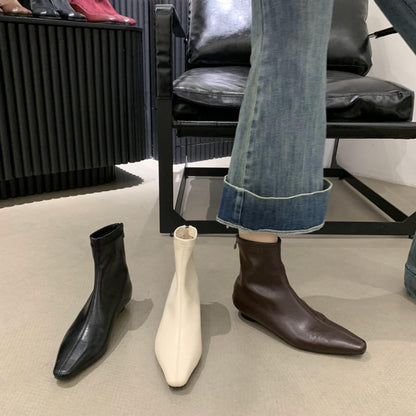 2025 Fried soft slope heel~ popular autumn and winter new white bone essence commuter flat-bottomed beige short boots simple