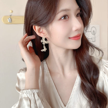 2025 Niche high-end micro-inlaid zirconium hollow butterfly earrings s925 silver needle design exquisite versatile temperament earrings