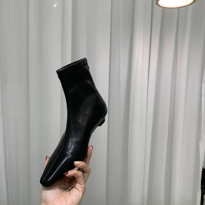 2025 Fried soft slope heel~ popular autumn and winter new white bone essence commuter flat-bottomed beige short boots simple