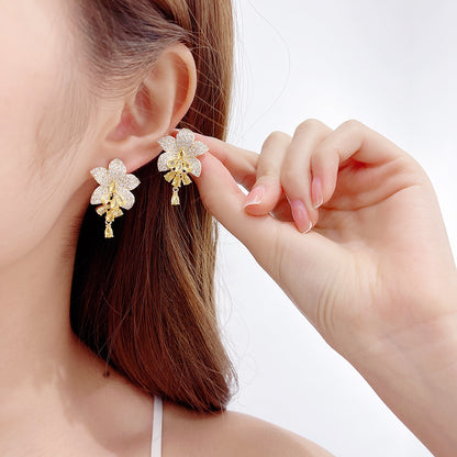 2025 Korean new style temperament fashion earrings copper inlaid colored zirconium earrings female 925 silver needle full zirconium inlaid flower earrings