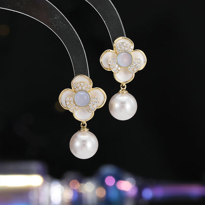 2025 High-end earrings female niche fresh fairy wind jade light luxury inlaid zircon s925 silver needle camellia earrings