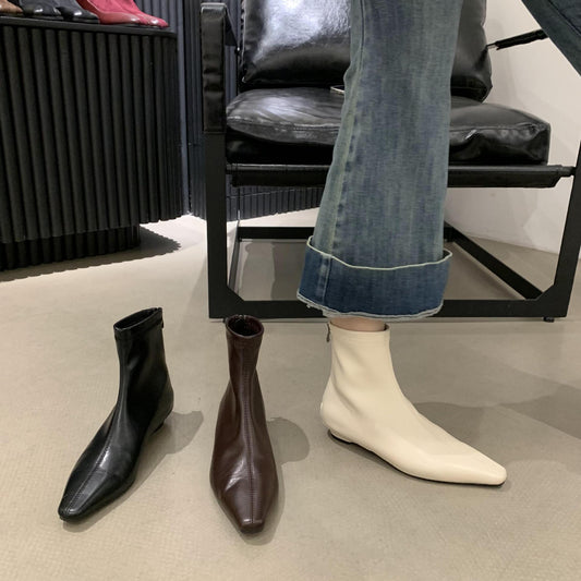 2025 Fried soft slope heel~ popular autumn and winter new white bone essence commuter flat-bottomed beige short boots simple