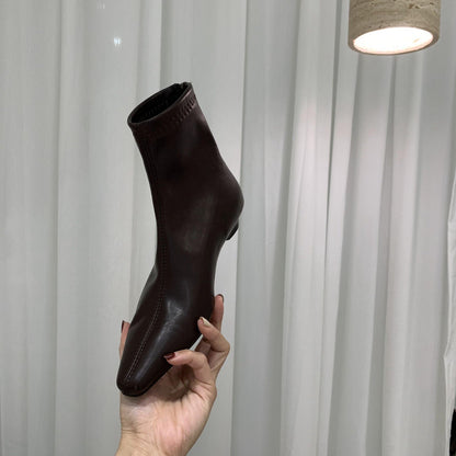 2025 Fried soft slope heel~ popular autumn and winter new white bone essence commuter flat-bottomed beige short boots simple