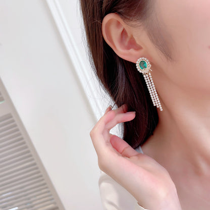2025 Light luxury high-end oval long bow fringed earrings s925 silver needle temperament niche elegant retro earrings