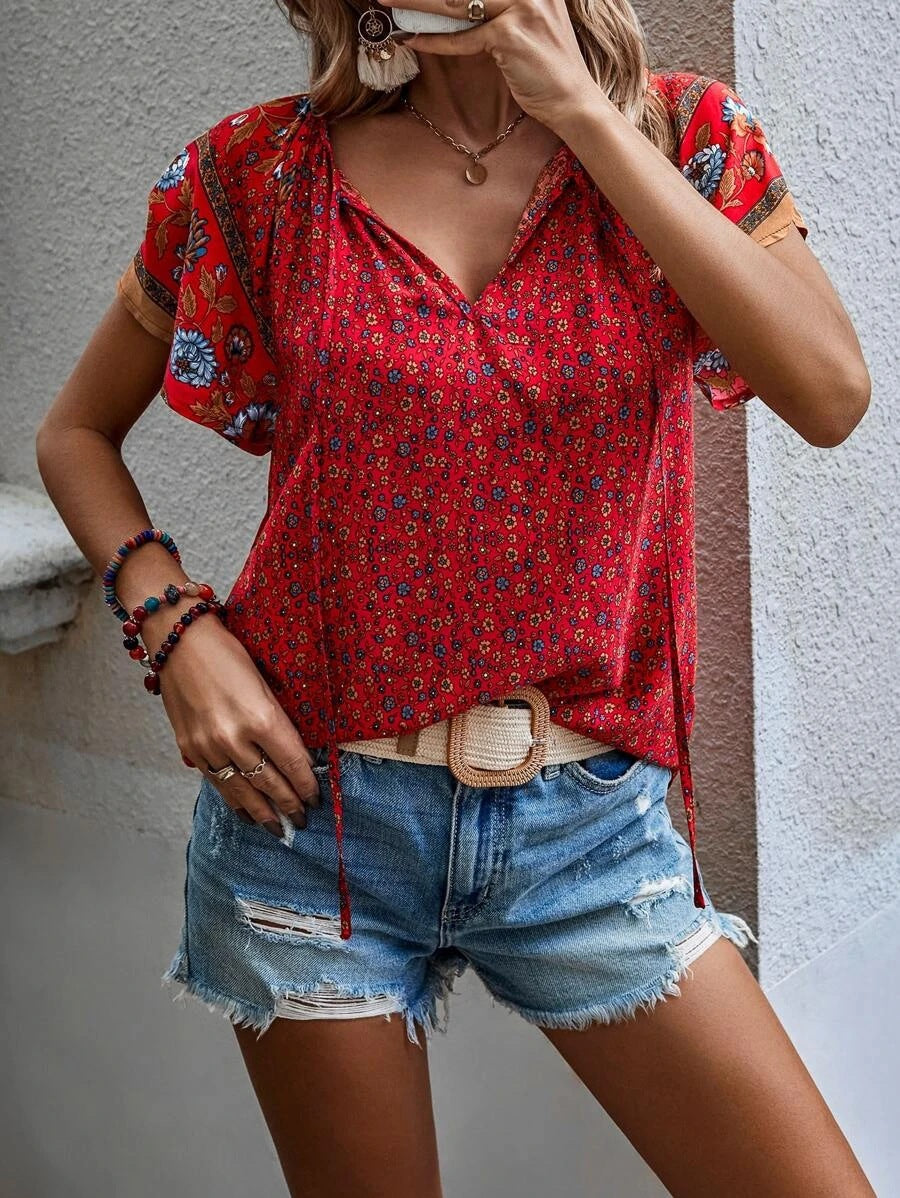 2025 Popular, ,  New women's clothing summer new casual celebrity style printing V-neck short-sleeved loose shirt