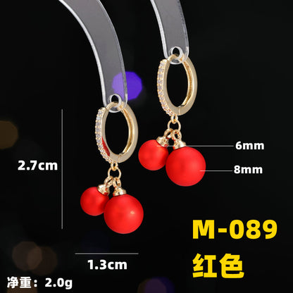 2025 Earrings suitable for Chinese New Year wear, simple and versatile, trendy temperament, red pearl niche design, autumn and winter earrings wholesale