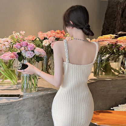 2025 Summer new vacation slim fit and thin temperament waist knitted suspender dress women's high waist backless hip skirt tide
