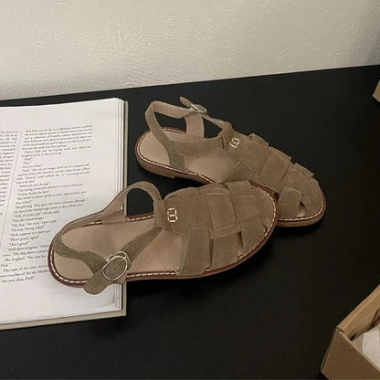 jinran Flat-soled Retro Genuine Leather Hollow Baotou Sandals Female Summer 2024 New Elegant Hollow Pig Cage Wrap Solid Women's Sandals
