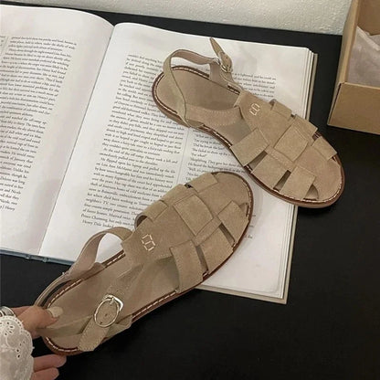 jinran Flat-soled Retro Genuine Leather Hollow Baotou Sandals Female Summer 2024 New Elegant Hollow Pig Cage Wrap Solid Women's Sandals